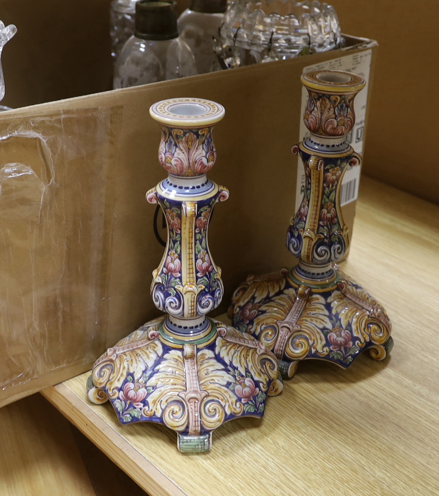 Two pairs of glass lustres, a larger lustre, other glassware, a pair of pottery candle sticks and ornamental cats